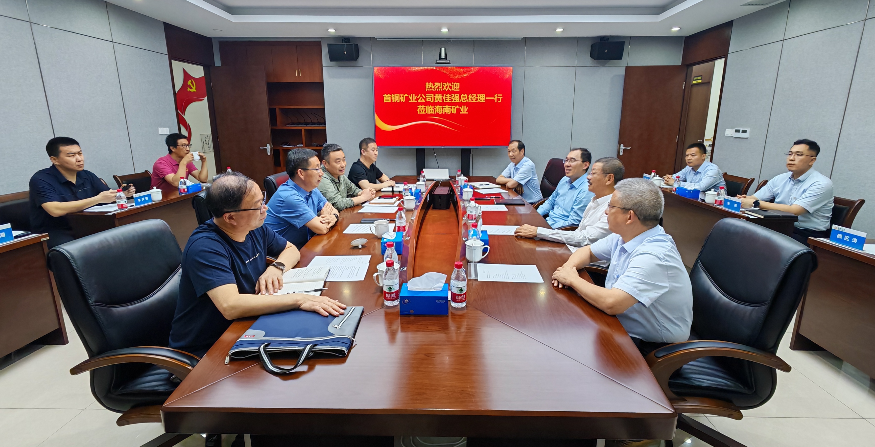 首钢矿业到访尊龙凯时 深化交流相助